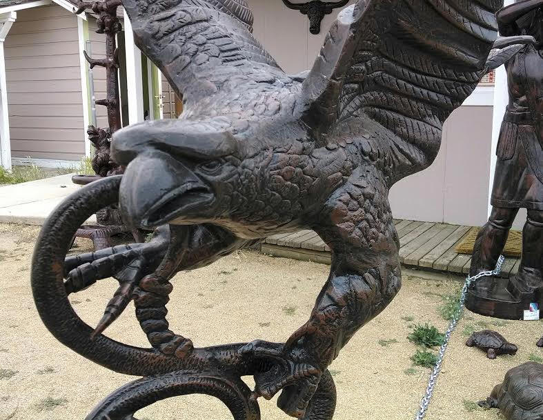 Large Eagle with Snake on Ball
